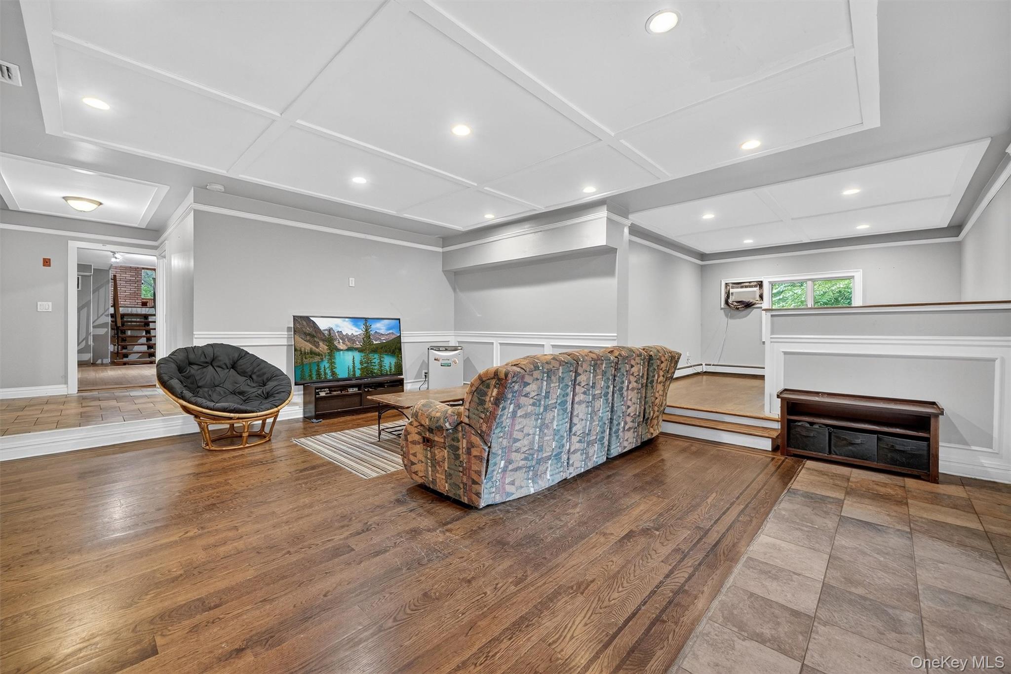 4 Cedar Hill Road Bedford, NY 10506 - Photo 37 of 50 a living room with furniture a table and wooden floor