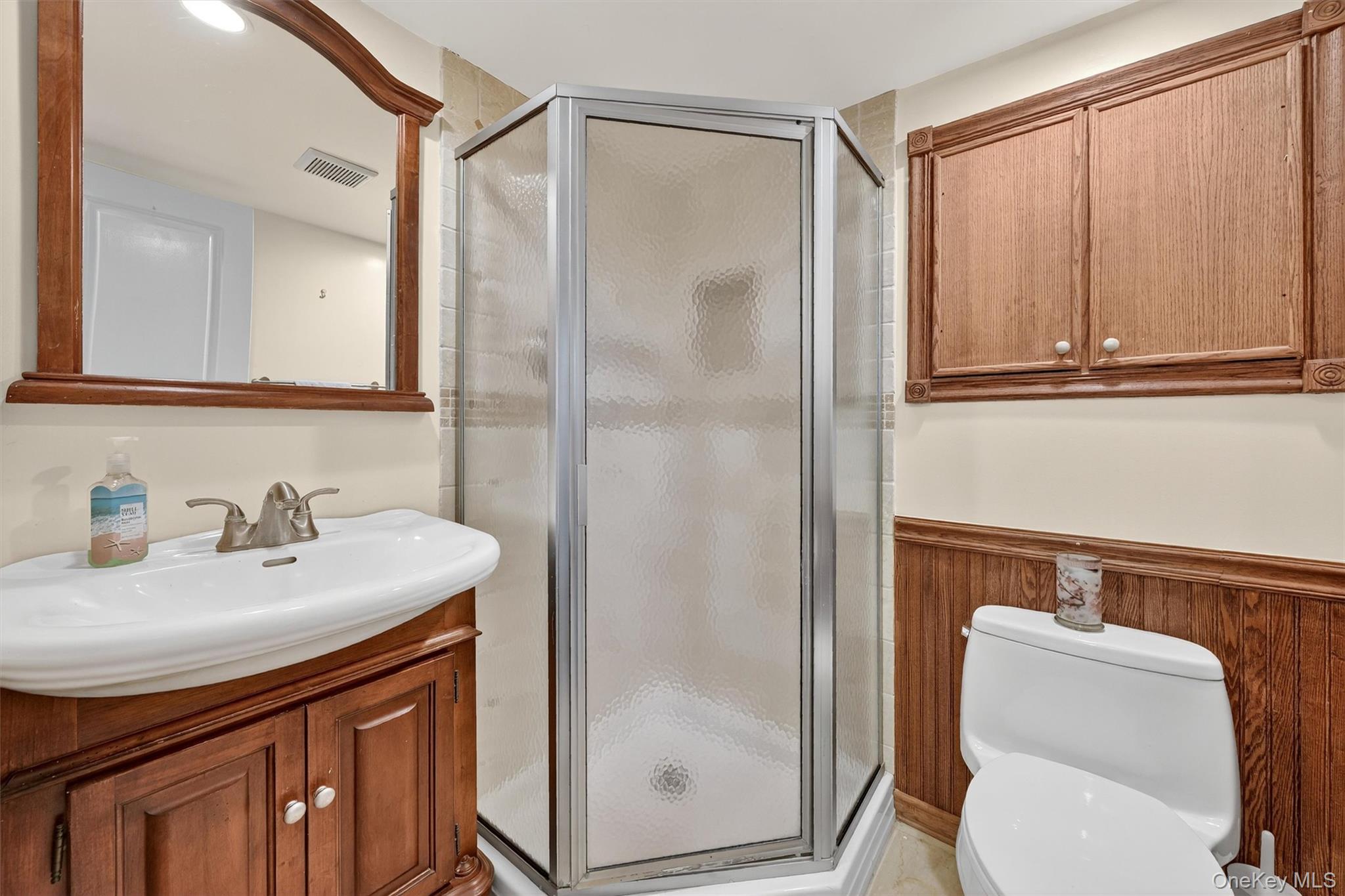 4 Cedar Hill Road Bedford, NY 10506 - Photo 40 of 50 a bathroom with a sink a toilet and shower
