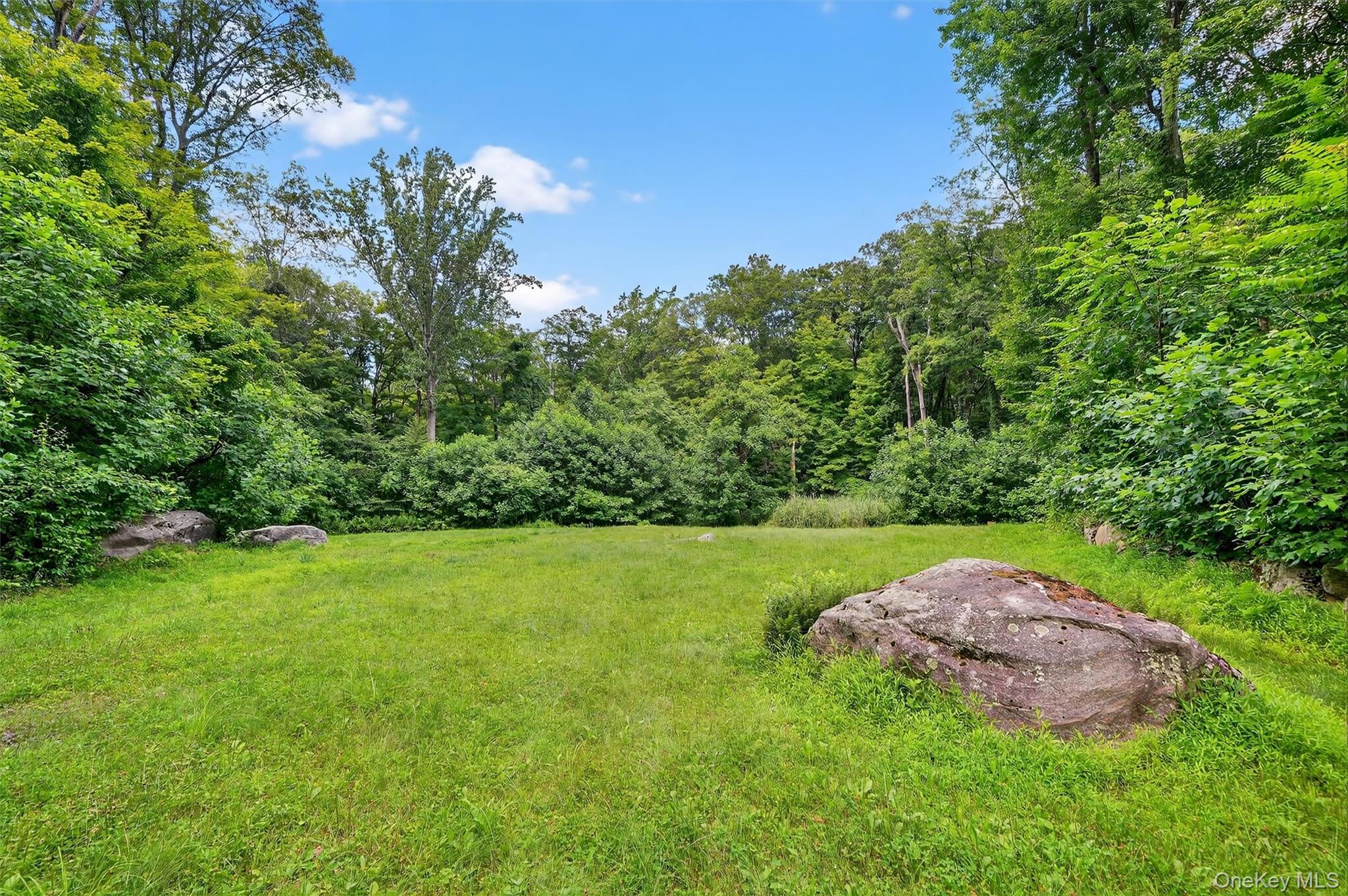 4 Cedar Hill Road Bedford, NY 10506 - Photo 45 of 50 a view of an outdoor space and a yard