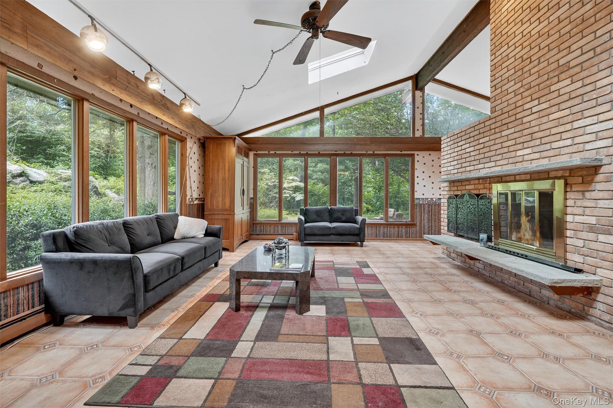 4 Cedar Hill Road Bedford, NY 10506 - Photo 7 of 50 a living room with furniture and a large window