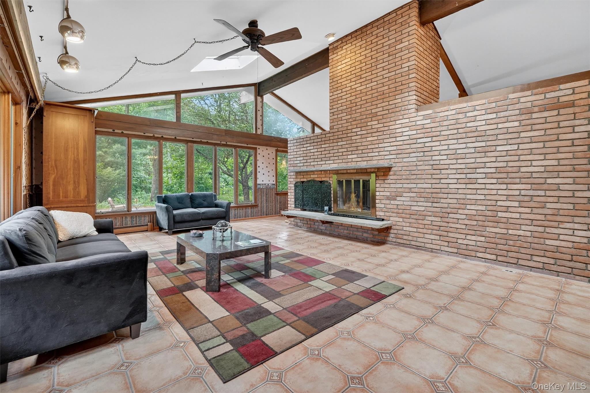 4 Cedar Hill Road Bedford, NY 10506 - Photo 8 of 50 a living room with furniture and a fireplace
