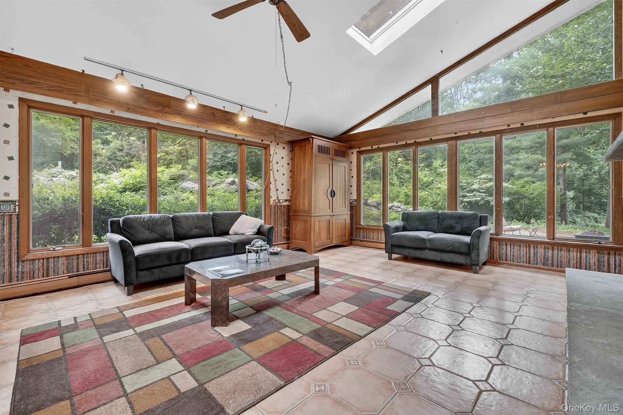 4 Cedar Hill Road Bedford, NY 10506 - Photo 9 of 50 a living room with furniture and large windows