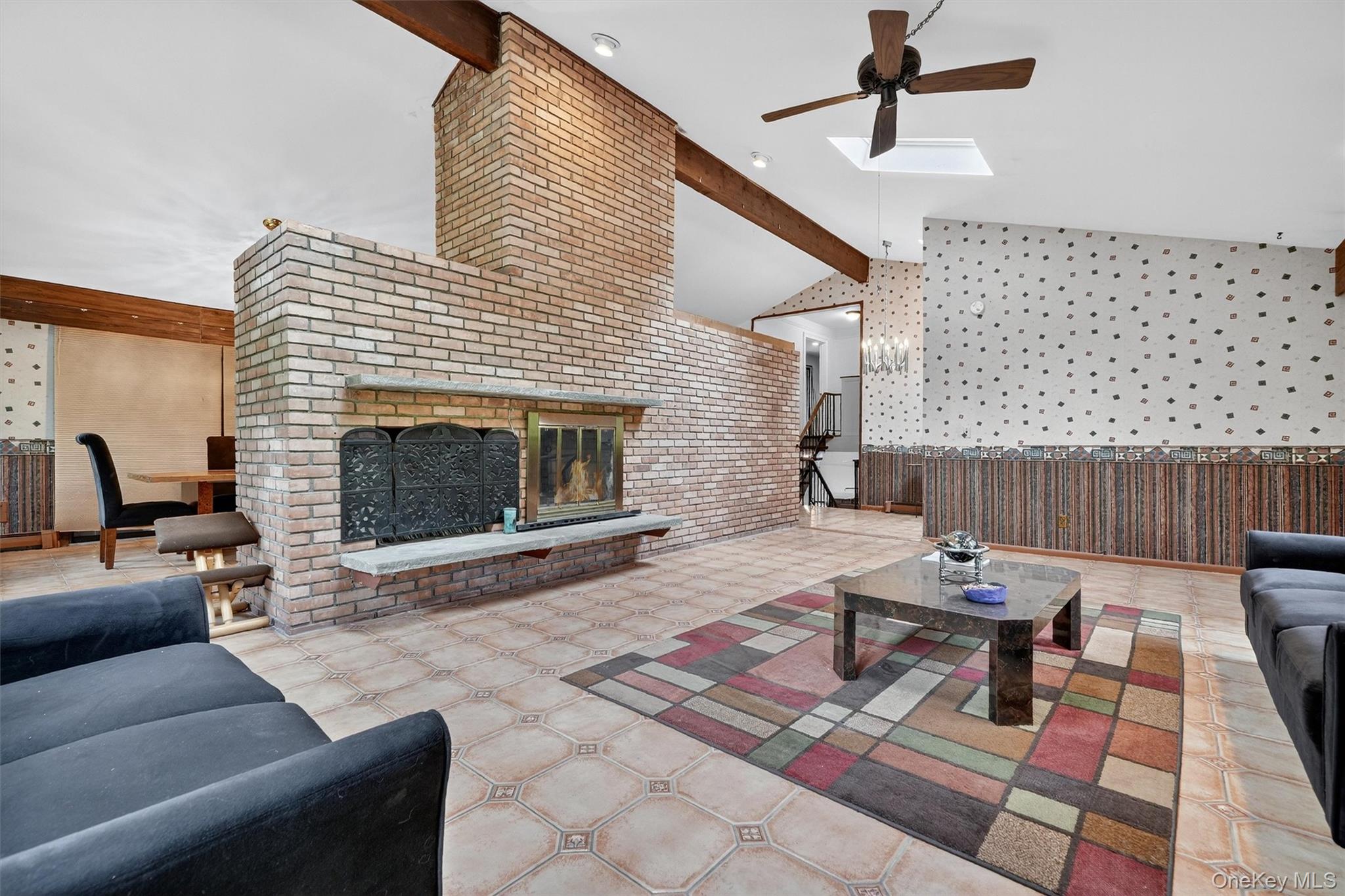 4 Cedar Hill Road Bedford, NY 10506 - Photo 10 of 50 a living room with furniture and a fireplace