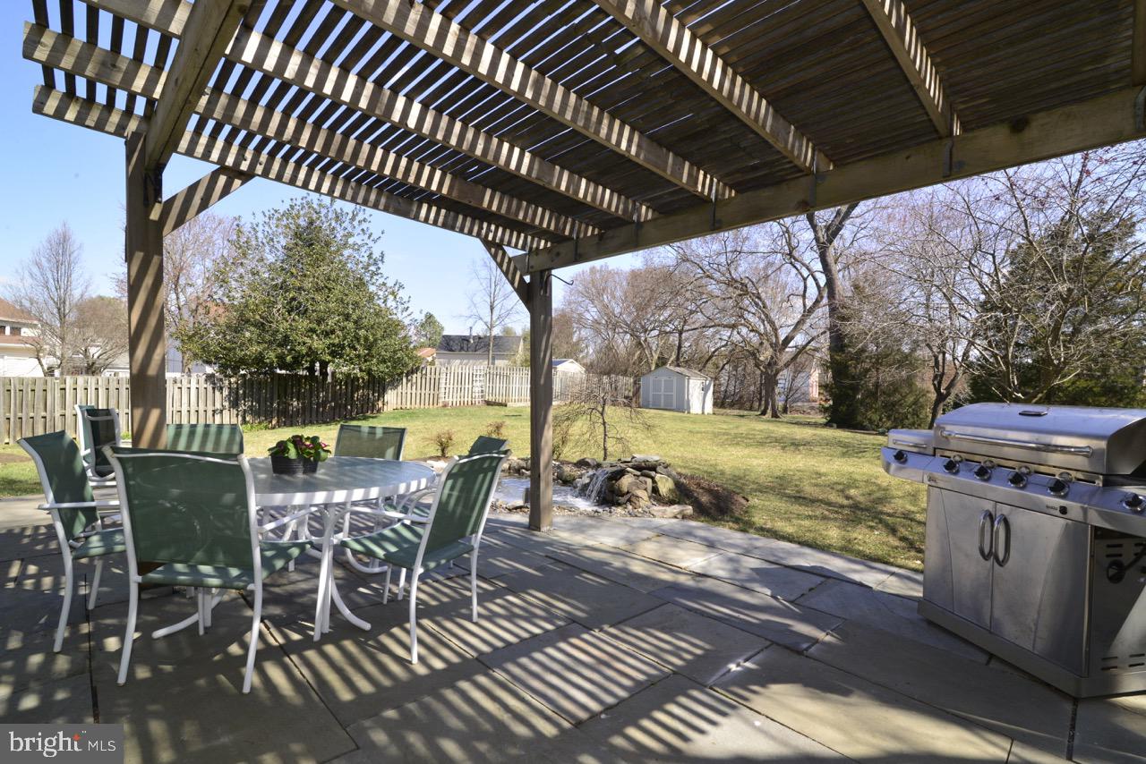 13366 Point Rider Lane Herndon, VA 20171 - Photo 29 of 40 Beautiful Slate Patio with Pergola