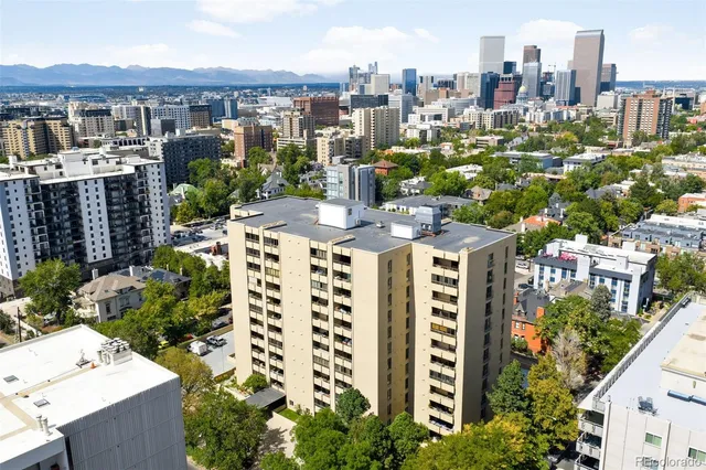 a view of a city with tall buildings