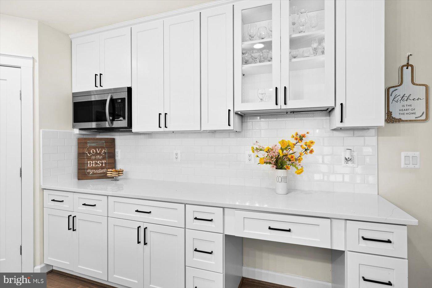 537 Monticello Circle Locust Grove, VA 22508 - Photo 18 of 107 a kitchen with stainless steel appliances white cabinets and a sink