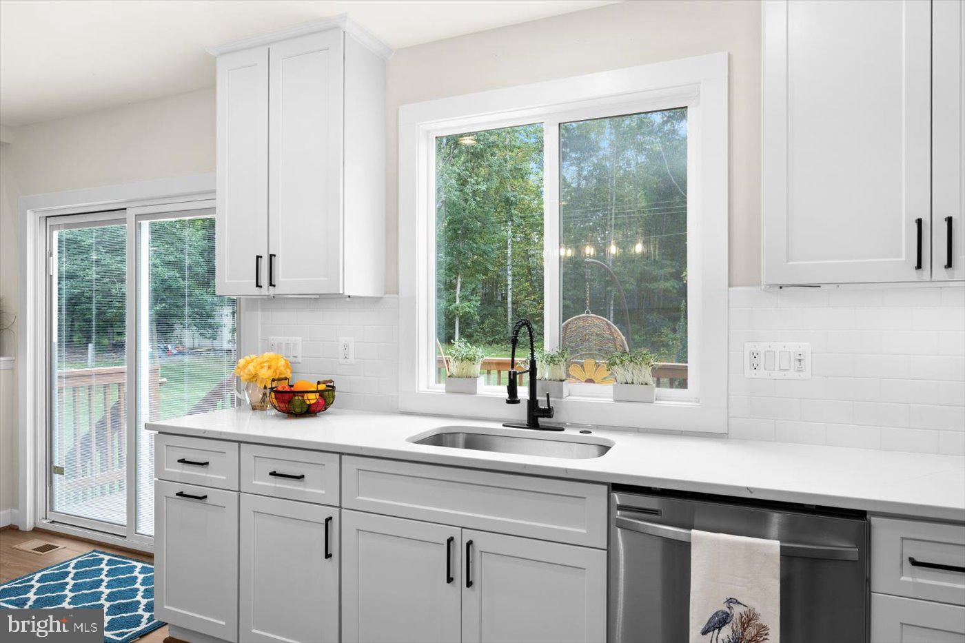 537 Monticello Circle Locust Grove, VA 22508 - Photo 22 of 107 a kitchen with a sink and a window
