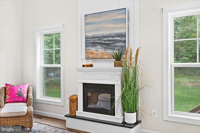 a bathroom with 2 sink and a mirror