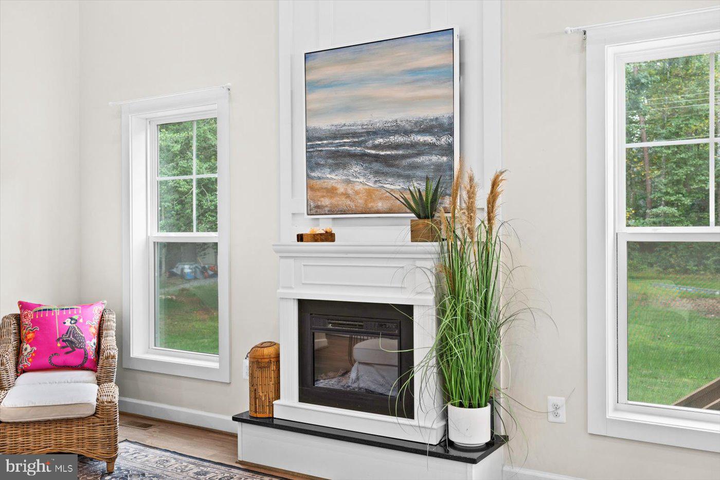 537 Monticello Circle Locust Grove, VA 22508 - Photo 28 of 107 a living room with furniture and a fireplace