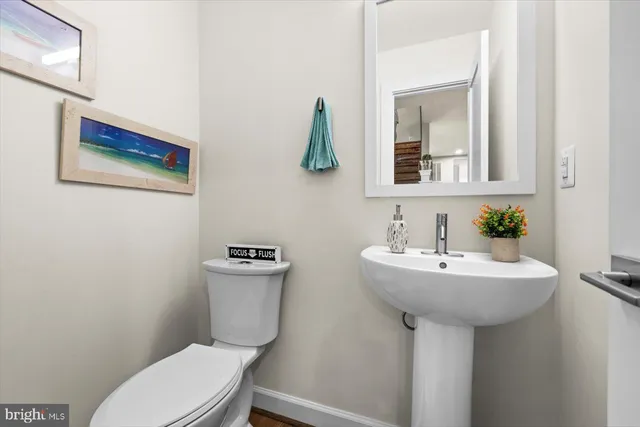 a front view of a house with a yard table and chairs