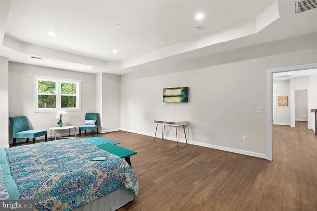 a view of a swimming pool with an outdoor space and seating area