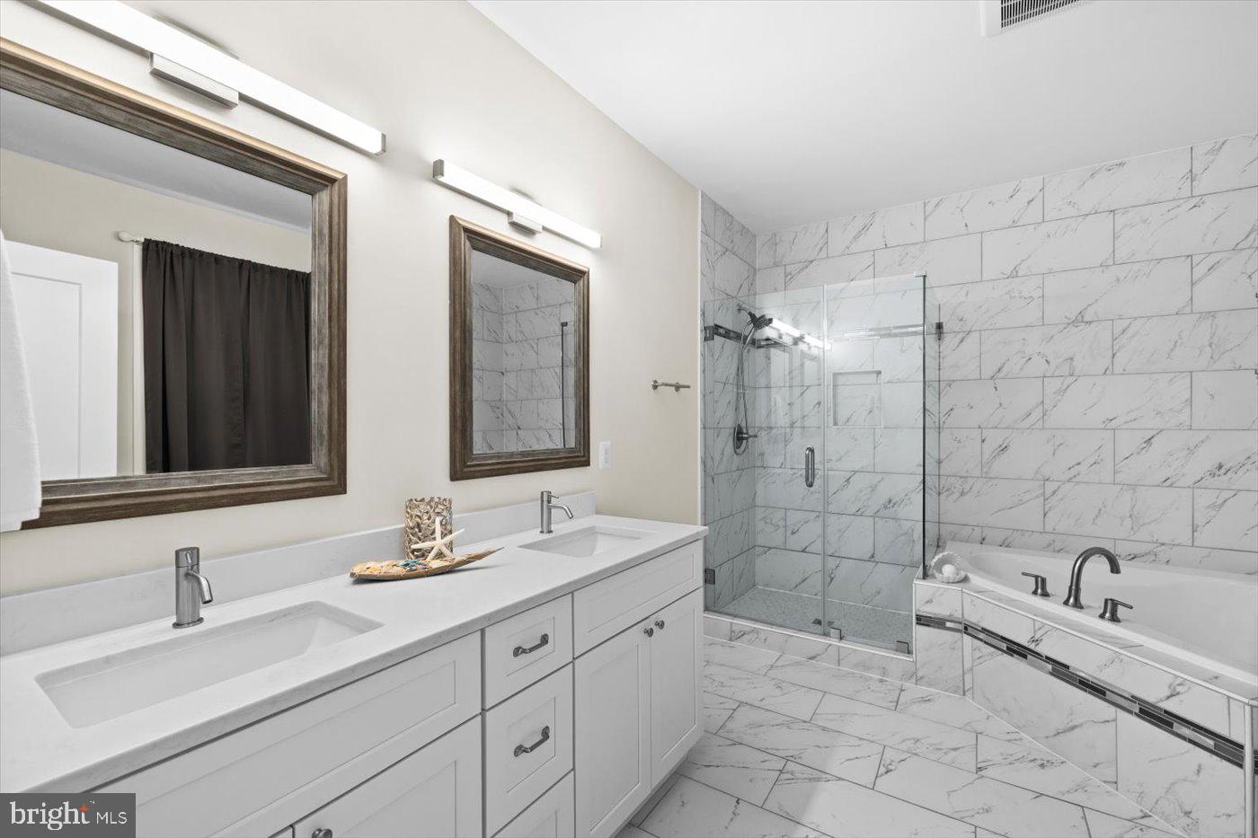 537 Monticello Circle Locust Grove, VA 22508 - Photo 46 of 107 a bathroom with double sink and a mirror