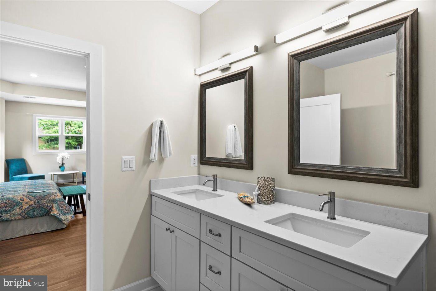 537 Monticello Circle Locust Grove, VA 22508 - Photo 49 of 107 a bathroom with 2 sink and a mirror