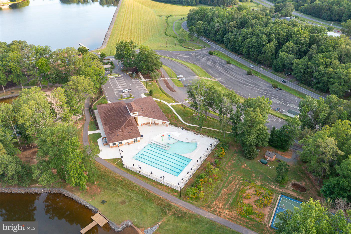 537 Monticello Circle Locust Grove, VA 22508 - Photo 70 of 107 an aerial view of a house with a garden and lake view