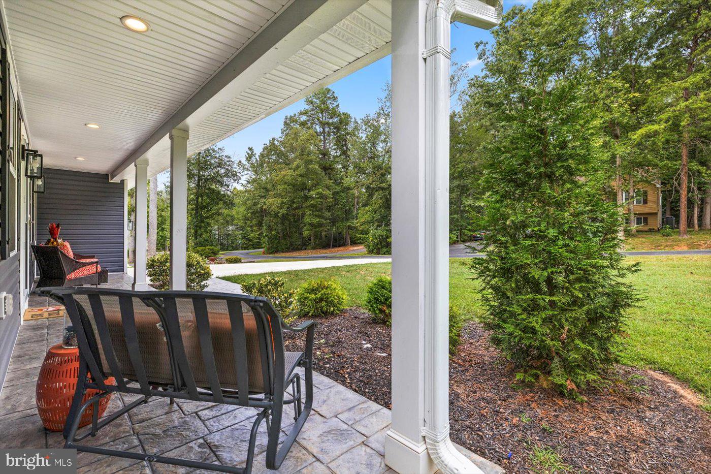 537 Monticello Circle Locust Grove, VA 22508 - Photo 7 of 107 a view of balcony with a table and chairs