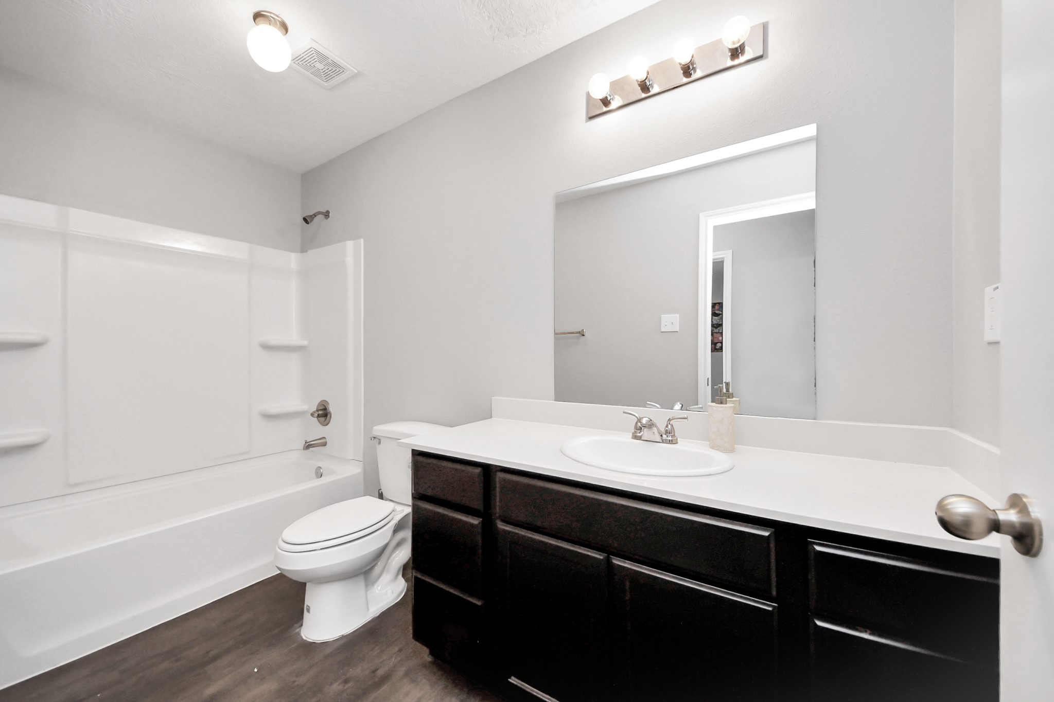 696 Road 5105 Cleveland, TX 77327 - Photo 20 of 25 a bathroom with a sink a toilet and shower