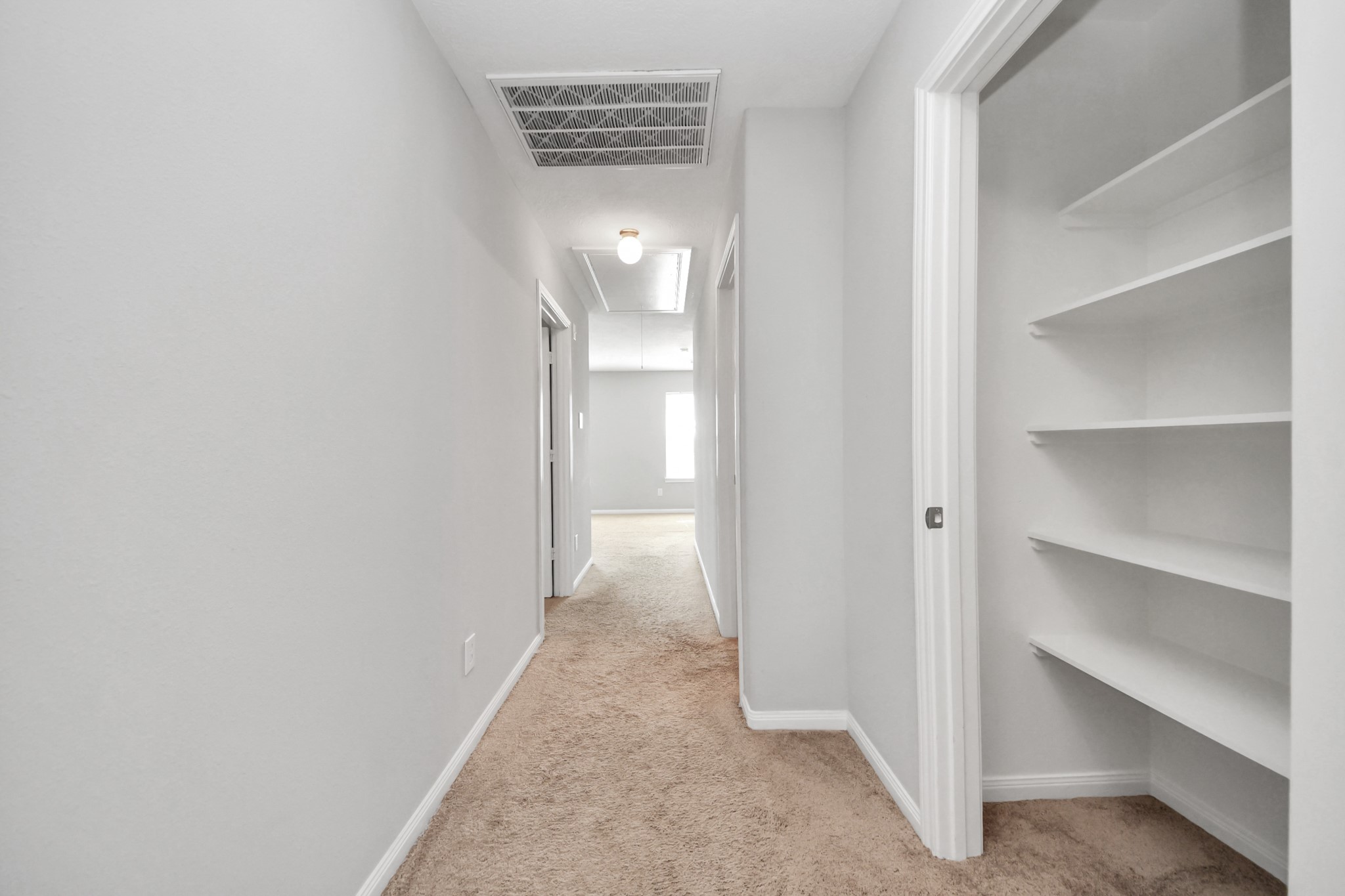 696 Road 5105 Cleveland, TX 77327 - Photo 21 of 25 a view of a hallway with closet
