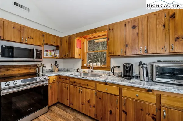 a bathroom with a shower and a toilet