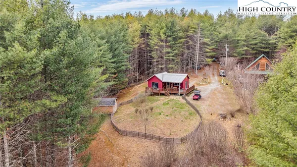 a kitchen with stainless steel appliances kitchen island granite countertop a refrigerator stove and sink