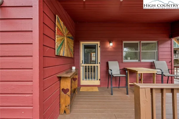 a kitchen with stainless steel appliances granite countertop a refrigerator a stove top oven a sink and dishwasher