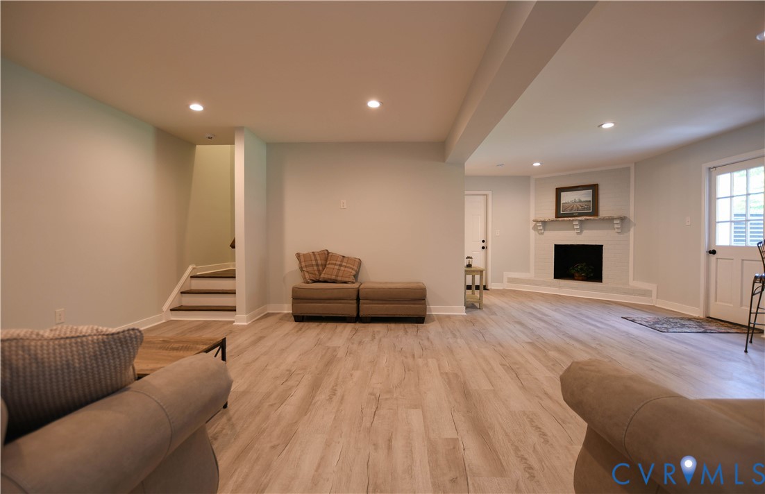 1448 Canterbury Road St. Stephens Church, VA 23148 - Photo 30 of 57 Spacious lower-level area featuring wood-finish fl