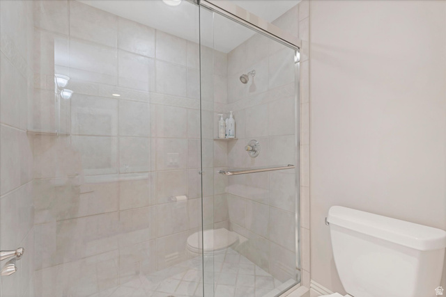 3222 Eagle View Circle Sandy, UT 84092 - Photo 30 of 60 Full bathroom featuring toilet and a stall shower