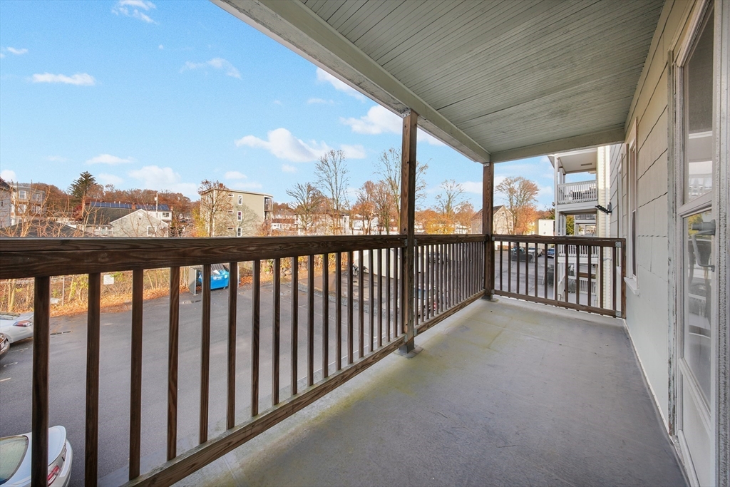 16 Bellevue Avenue, Unit 4 Brockton, MA 02302 - Photo 8 of 10 a view of a city street from a balcony
