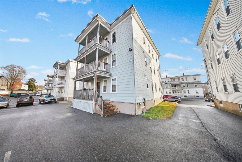 16 Bellevue Avenue, Unit 4 Brockton, MA 02302 - Photo 9 of 10 a view of a street with cars