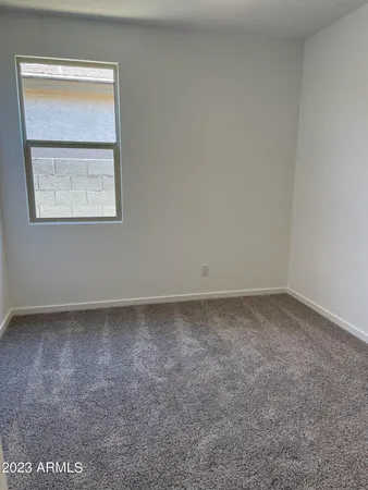 an empty room with a door