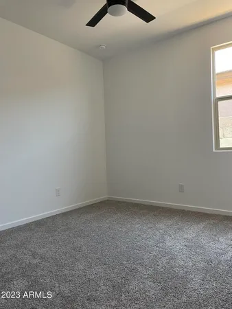 a view of a window in an empty room