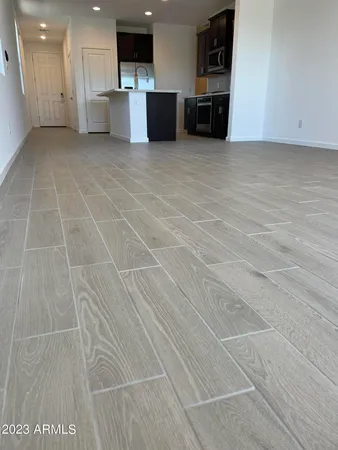a view of kitchen with furniture and cabinets