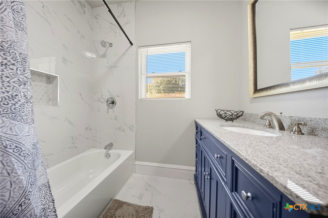 1202 South 7th Street Temple, TX 76504 - Photo 19 of 33 Bathroom - Tub Shower with Vanity