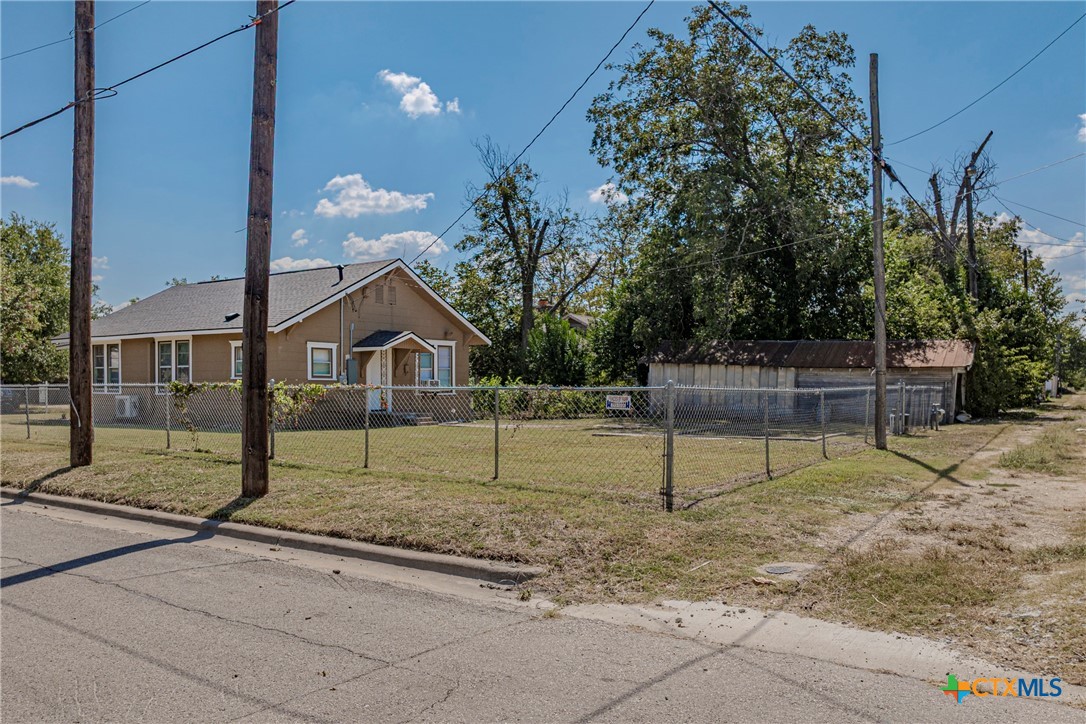 1202 South 7th Street Temple, TX 76504 - Photo 29 of 33 Back Yard viewed from Corner of W Ave L and alleyway behind property