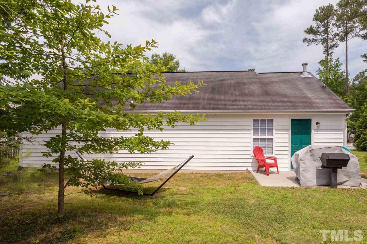 6007 Newhall Road Durham, NC 27713 - Photo 22 of 25 a view of a swimming pool with a patio