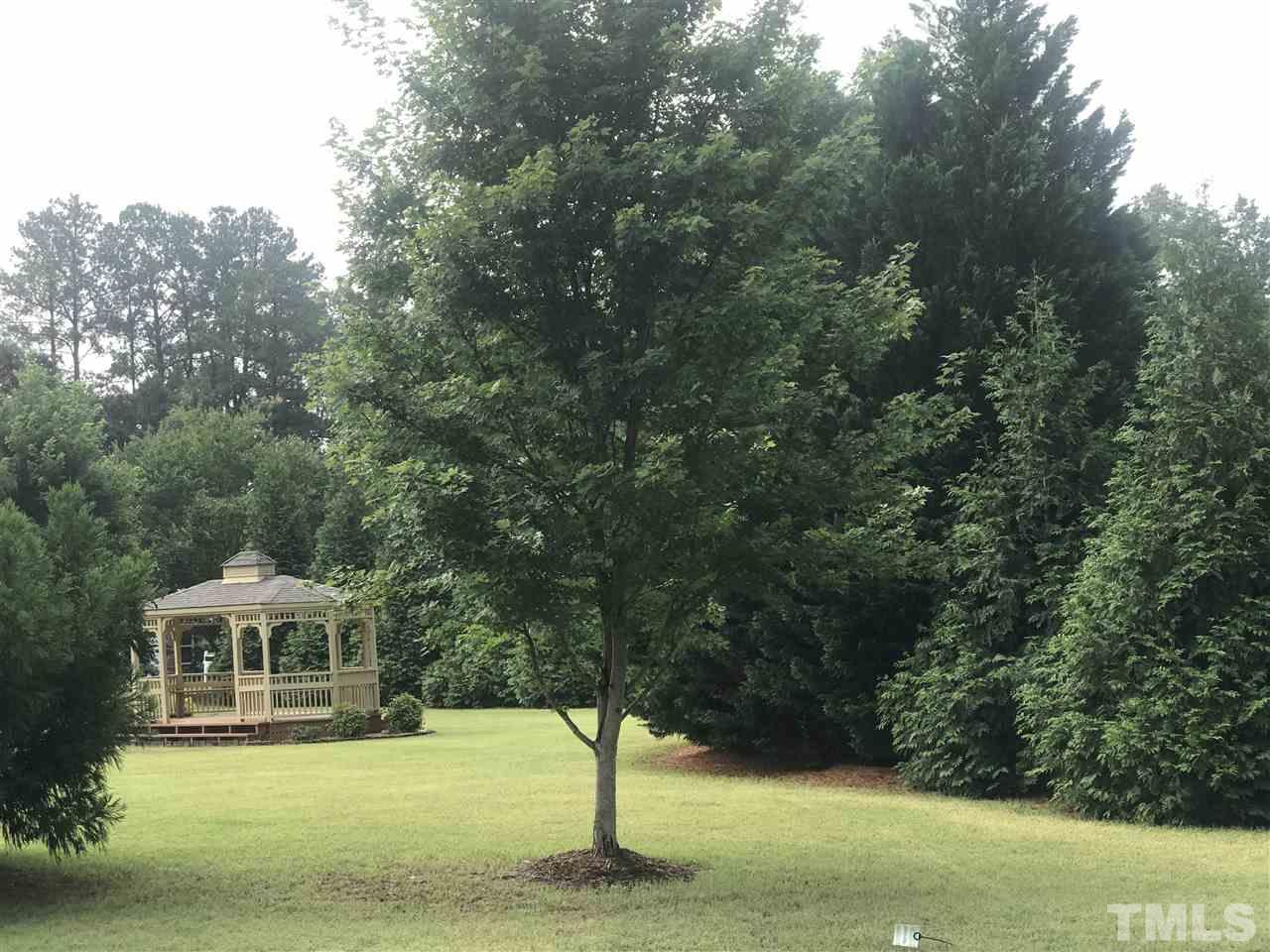 6007 Newhall Road Durham, NC 27713 - Photo 25 of 25 a front view of a house with a yard