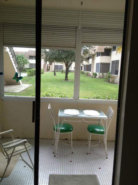 8410 West Sample Road, Unit 114 Coral Springs, FL 33065 - Photo 7 of 8 Garden View