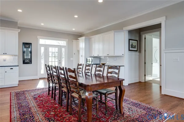 a living room with fireplace furniture and a flat screen tv