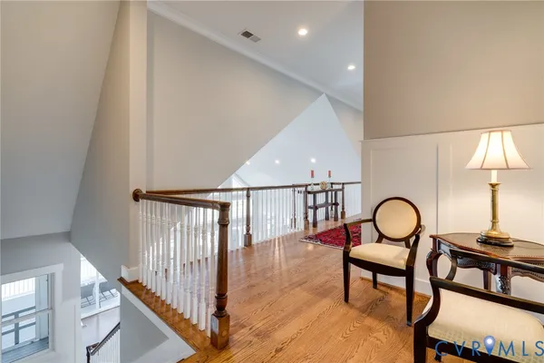 a living room with fireplace furniture and a flat screen tv