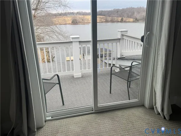 a view of a balcony with furniture