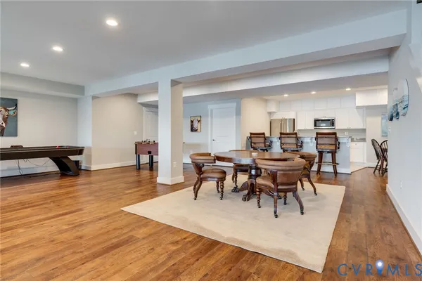 a view of a big yard with a house in the background