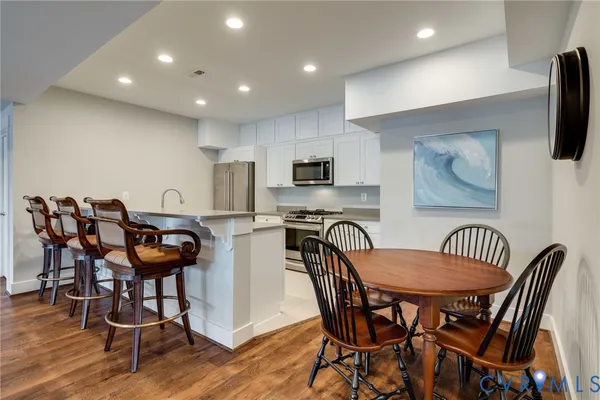 a view of a dining room with furniture window and outside view