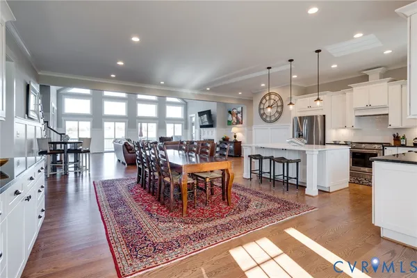 a living room with fireplace furniture and a flat screen tv