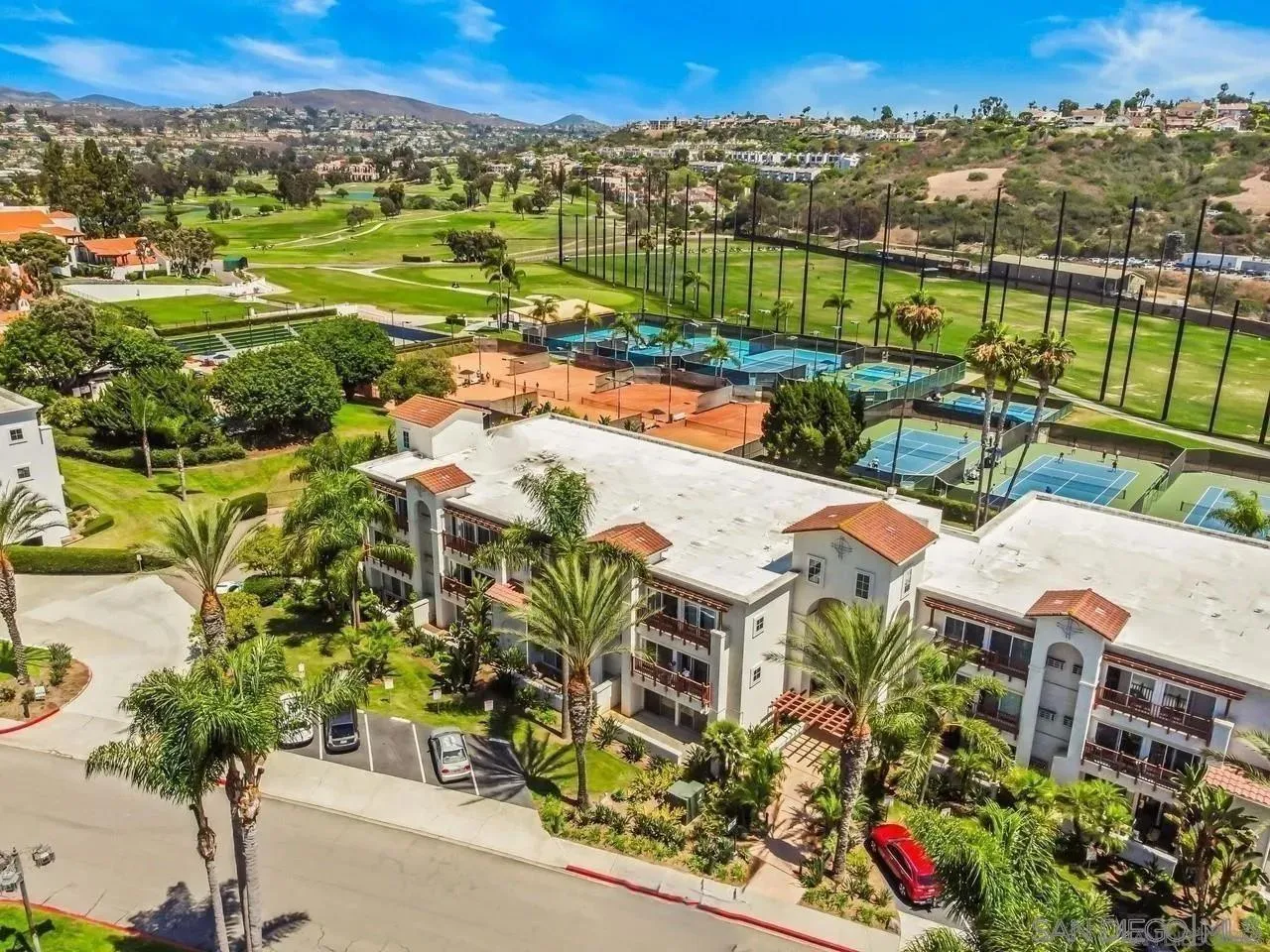 2003 Costa Del Mar Road, Unit 692 Carlsbad, CA 92009 - Photo 2 of 42 an aerial view of residential houses with outdoor space and street view