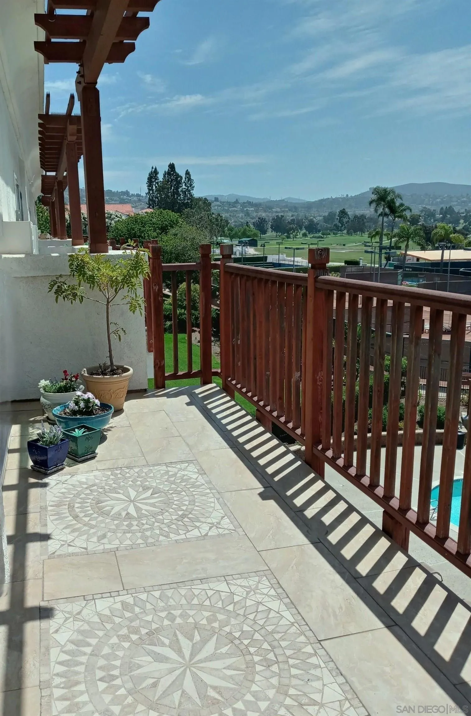 2003 Costa Del Mar Road, Unit 692 Carlsbad, CA 92009 - Photo 3 of 42 a view of a backyard