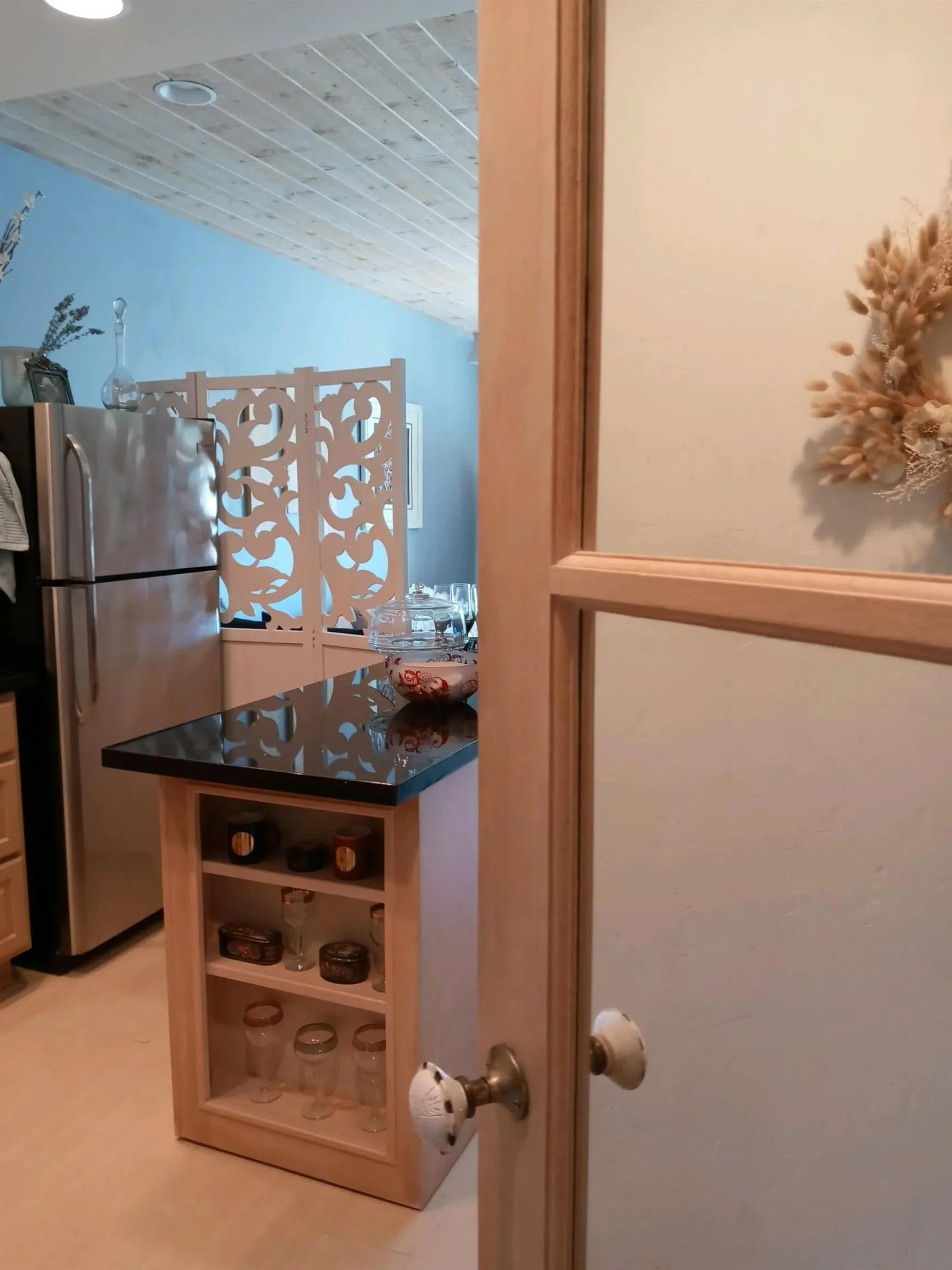 2003 Costa Del Mar Road, Unit 692 Carlsbad, CA 92009 - Photo 9 of 42 a room with a refrigerator and a stove