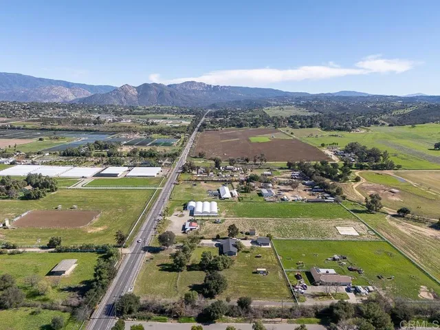 a view of a city with mountains