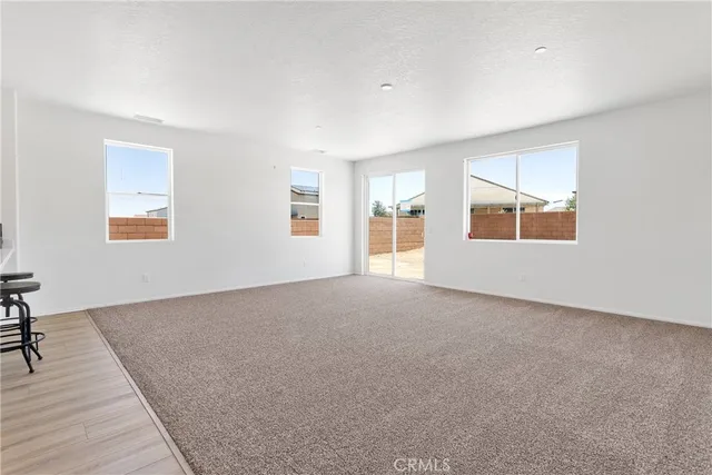 a bathroom with a bathtub shower sink vanity and toilet