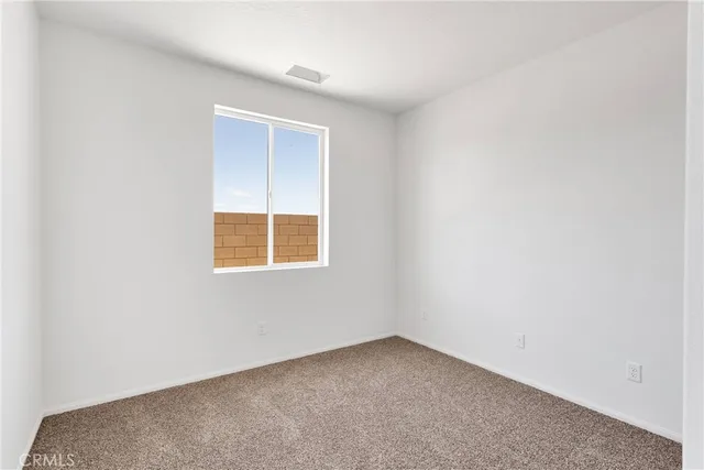an empty room with window