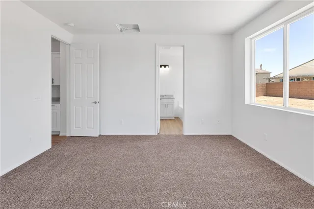 a bathroom with a bathtub and a sink