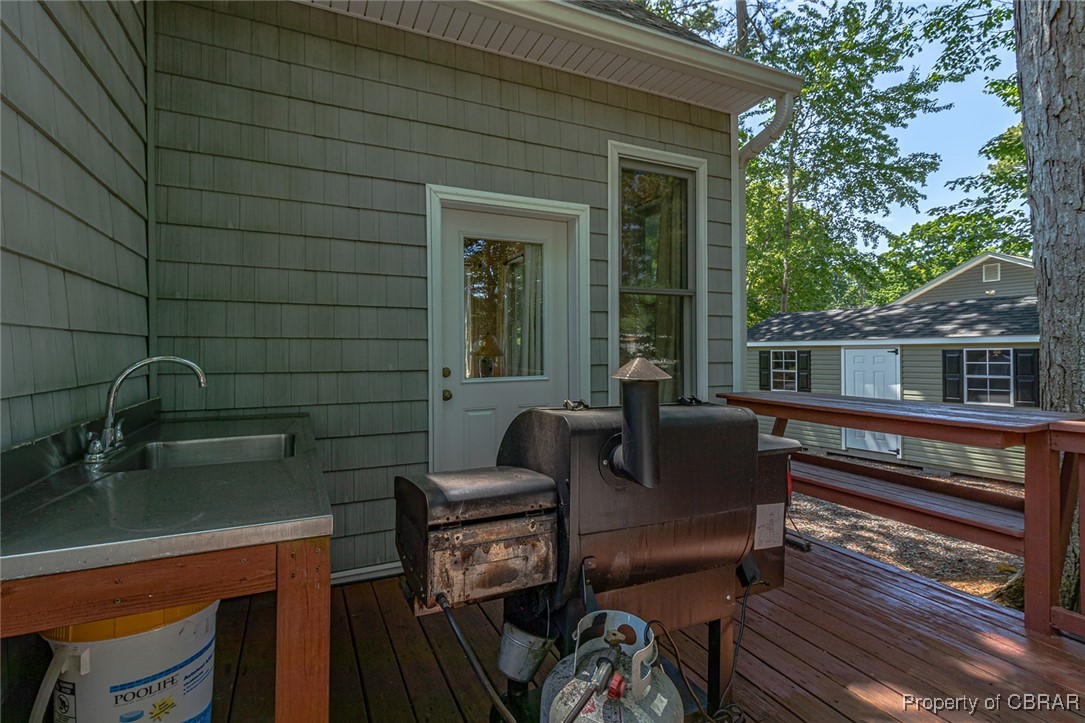 189 Virginia Road Reedville, VA 22539 - Photo 35 of 46 Wooden deck featuring a sink